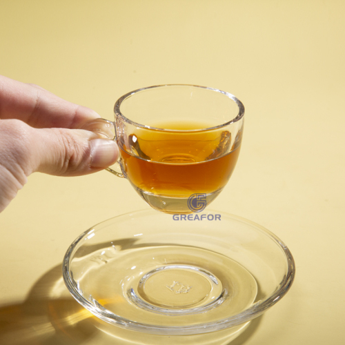 Diseños personalizados, venta al por mayor, taza de vidrio para café transparente con plato